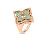The Roberto Coin VENETIAN PRINCESS PIROUETTE MEDIUM FLOWER RING in rose gold showcases a four-petal flower with soft green enamel inlays and smooth edges, elegantly displayed on a white background.