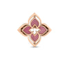 The gold lotus-shaped pendant with pink enamel and central floral cutout pairs beautifully with the VENETIAN PRINCESS PIROUETTE MEDIUM FLOWER RING by Roberto Coin for an elegant, coordinated look.