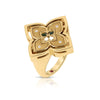 The VENETIAN PRINCESS PIROUETTE MEDIUM FLOWER RING by Roberto Coin features a bold floral design with petal-shaped sections, inset diamonds, green enamel accents at the center, and a polished gold band.