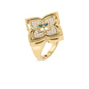 The VENETIAN PRINCESS PIROUETTE PAVE FLOWER RING by Roberto Coin Staging showcases an 18K gold floral design, set with sparkling white gems and four blue-green gemstone accents on a sleek, polished band for elegant allure.