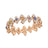 The VENETIAN PRINCESS CARNIVAL PAVE DIAMOND AND MIXED STONES CUT FLOWERS BRACELET by Roberto Coin is crafted in 18K rose gold and showcases diamond and multi-colored gemstone flowers in a repeating, sparkling floral pattern.