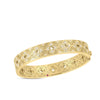 The VENETIAN PRINCESS ETCHED FRAME DIAMOND FLOWER BANGLE by Roberto Coin is crafted in 18K yellow gold with intricate floral and geometric patterns, sparkling diamonds, white stones, and a delicate pink gemstone accent.