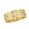 The VENETIAN PRINCESS ETCHED FRAMED DIAMOND FLOWER WIDE BANGLE by Roberto Coin features 18K yellow gold, floral and geometric cutouts with diamond accents, and a polished finish that reflects Italian luxury and sophistication.
