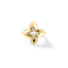 Yellow gold flower ring with diamond accents on a white background