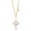Yellow gold necklace with a mother of pearl and diamond floral pendant on a white background