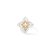 Yellow gold and mother of pearl flower ring with diamond accents on a white background