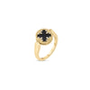 The VENETIAN MEDALLIONS SMALL REVERSIBLE RING by Roberto Coin showcases a round black stone center with diamond accents, a twisted rope-style 18K yellow gold border, and a smooth polished band—an elegant design inspired by Venetian Medallions.