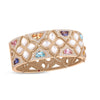 The VENETIAN PRINCESS CARNIVAL wide bangle by Roberto Coin features 18K rose gold, pavé diamonds, mother of pearl, and colorful mixed stones—a stunning floral design inspired by Venetian elegance.