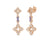 The VENETIAN PRINCESS CARNIVAL PAVE DIAMOND AND TANZANITE FLOWER DANGLE EARRINGS by Roberto Coin feature 18K rose gold, two diamond floral motifs, a rectangular tanzanite connector, and intricate stud-backed design.