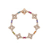 The VENETIAN PRINCESS CARNIVAL PAVE DIAMOND AND MIXED BAGUETTE FLOWER BRACELET by Roberto Coin is crafted in 18K rose gold, featuring diamond pave and mixed baguette floral motifs in an intricate circular design.