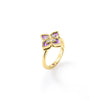 Front view of a yellow gold ring featuring lavender enamel and diamonds on a white background