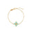 Gold chain bracelet with turquoise ceramic enamel four-petal flower charm set with diamonds and gold lobster clasp.