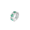The LOVE IN VERONA DIAMOND AND EMERALD OPEN FRAME RING by Roberto Coin is crafted in 18K white gold with clusters of round emeralds and rectangular diamonds in an intricate, overlapping design.