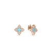 Pair of rose gold flower stud earrings with light blue gemstone centers and pavé diamond accents on four petals.