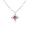 The Roberto Coin DIAMOND PRINCESS LUCE DIAMOND AND RUBELLITE FLOWER NECKLACE features a silver chain with a cross-shaped pendant adorned with four round rubellites at the center, surrounded by baguette-cut clear stones.