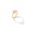 Side view of yellow gold and diamond floral ring on a white background