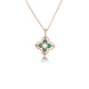 The VENETIAN PRINCESS PIROUETTE PAVE SMALL FLOWER NECKLACE by Roberto Coin features a four-petal flower pendant with green enamel inlay, 18K rose gold outline, and pavé diamonds above the pendant, all on a gold chain. Background is white.