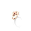 The LOVE IN VERONA RUBELLITE DOUBLE FLOWER RING by Roberto Coin is crafted in 18K rose gold, featuring a four-petal flower design with a central pink rubellite gemstone, shown on a white background with a soft shadow.
