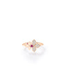 The LOVE IN VERONA DIAMOND AND RUBELLITE SPLIT FLOWER RING by Roberto Coin features an 18K rose gold design with one diamond-studded wing, a solid side, and a rubellite accent—a unique statement piece.