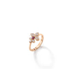 The Roberto Coin LOVE IN VERONA PAVE DIAMOND AND RUBELLITE SPLIT FLOWER RING features pave diamonds on flower-shaped petals and a central pink rubellite, beautifully displayed on a white background with a soft shadow.