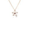 The TIARE' Diamond, Rubellite, and Mother of Pearl Flower necklace by Roberto Coin features diamond-encrusted petals and a vivid rubellite center, beautifully displayed against a white background.