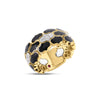 Side view of yellow gold and black enamel ring with white gold diamond accents on a white background
