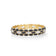The COBRA DIAMOND AND ENAMEL WIDE CUFF BANGLE by Roberto Coin features a repeating clover design with black and white enamel sections and set diamonds, creating a strikingly elegant and luxurious look.