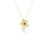 Gold flower-shaped necklace with a red gemstone on a white background