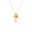 Gold flower-shaped necklace with a green gemstone on a white background