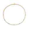 Yellow gold and white enamel collar necklace with diamond accents on a white background