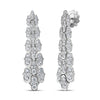 White gold flat link dangle earrings with pave diamond finish on a white background