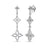 White gold triple flower dangle earrings with diamond accents on a white background