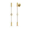 Yellow gold dangle earrings with alternating bar and diamond bezel stations on a white background