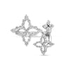 Front view of white gold triple flower ring with pave diamonds on a white background