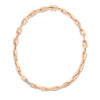 Rose gold link chain necklace with single white gold and pave diamond link on a white background