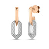 Rose gold link chain dangle earrings with single white gold and pave diamond link on a white background
