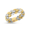 Side view of alternating yellow and white gold ring on a white background 