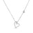 White gold open frame heart necklace with pave diamond outline and dangling center diamond on a white background
