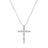 White gold cross necklace with emerald and round cut diamonds on a white background
