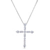 White gold cross necklace with emerald and round cut diamonds on a white background