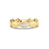 Front view of yellow gold link ring with diamond accents on a white background