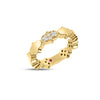 Side view of yellow gold link ring with diamond accents on a white background