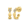 Yellow gold open back hoop earrings with a diamond accent link on a white background