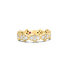 Front view of yellow gold ring with pave diamond links on a white background