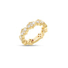 Side view of yellow gold ring with pave diamond links on a white background