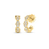 Yellow gold and pave diamond open back hoop earrings on a white background
