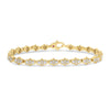 Yellow gold bracelet with pave diamond links on a white background