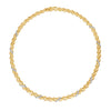 Yellow and white gold collar necklace with diamond accents on a white background