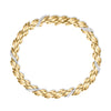 Yellow and white gold bracelet with diamond accents on a white background