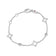 Yellow gold bracelet with open frame and diamond stations on a white background